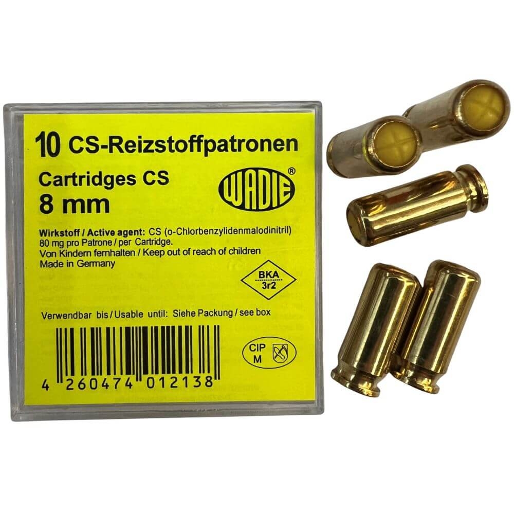 Gelbe Verpackung mit 10 Wadie CS-Reizstoffpatronen 8mm und einzelnen Messingpatronen daneben